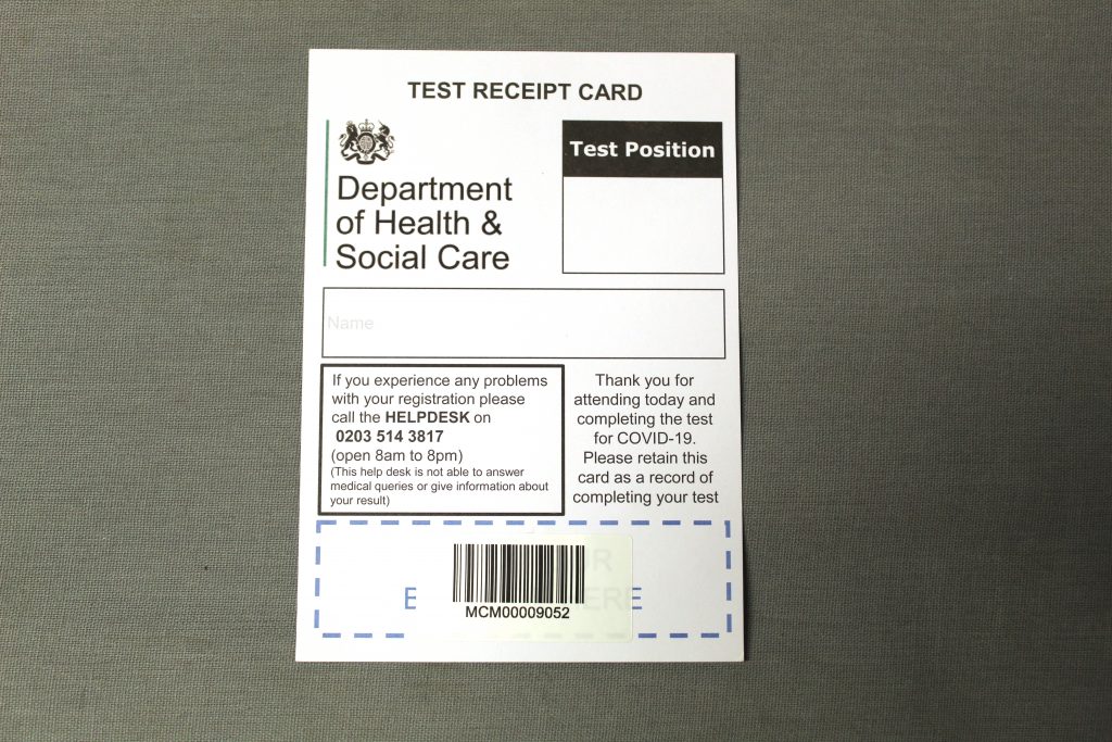 STOPM_2020_371_2b: Test receipt card with the barcode sticker on.