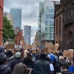 STOPM_2020_455_456b: photograph showing a large number of people in a protest march, in Manchester. The people in front are holding home made signs, which are plain on the back. The march was in Manchester on Saturday 6th June 2020.  Thumbnail